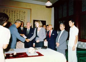 Mrs. Sackler presents first payment to President Ding Shisun in September, 1986